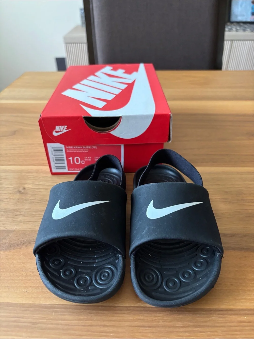 Nike Kids Black Slide Sandals with White Swoosh and Heel Strap